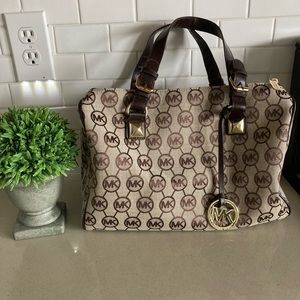 Michael Kors canvas tote. Excellent condition.